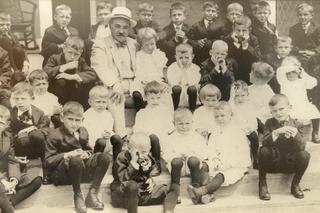 Milton Hershey and the early students of the school that bears his name in 1913.