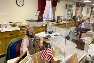 Columbia County Elections Director Matthew Repasky answers phones during the May 2023 municipal primary.