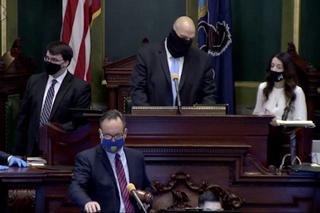 Lt. Gov. John Fetterman (center) confers with Senate Secretary Megan Martin (right), as Sen. Jake Corman (front, center), takes over the session to conduct a vote to remove Fetterman from residing over the session in Harrisburg on Tuesday, Jan. 5, 2021. Bobby Maggio, Fetterman’s chief of staff, stands to the left. Lt. Gov. John Fetterman (center) confers with Senate Secretary Megan Martin (right), as Sen. Jake Corman (front, center), takes over the session to conduct a vote to remove Fetterman from residing over the session in Harrisburg on Tuesday, Jan. 5, 2021. Bobby Maggio, Fetterman’s chief of staff, stands to the left.