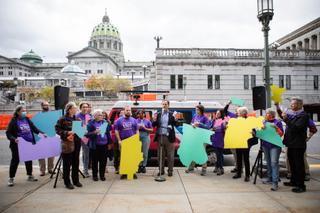 Members of the Draw the Lines initiative gathered outside the Capitol in late October to call on legislators to produce a fair congressional district map via a transparent process.