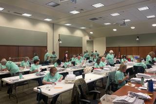 Poll workers process mail ballots in Lancaster County on Nov. 8, 2022. Poll workers process mail ballots in Lancaster County on Nov. 8, 2022.