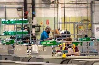 Workers count Philadelphia's mail ballots for the May 18 primary election.