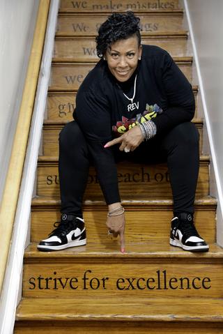 The Rev. Michelle Simmons, founder and executive director of Why Not Prosper, points to one of the inspirational messages on the staircase risers at a Why Not Prosper recovery home in Philadelphia. Her organization received a license for one of its recovery homes, and Simmons plans to seek licenses for its other facilities. The Rev. Michelle Simmons, founder and executive director of Why Not Prosper, points to one of the inspirational messages on the staircase risers at a Why Not Prosper recovery home in Philadelphia. Her organization received a license for one of its recovery homes, and Simmons plans to seek licenses for its other facilities.