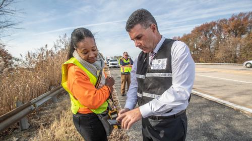 Tim Boyce, the director of Emergency Management of Delaware County, right, confers with Quadirah Glover, with the Pennsylvania Department of Emergency Preparedness, as they try to determine the source of gas leak that was reported in Chester City on Novemebr 11, 2019.
