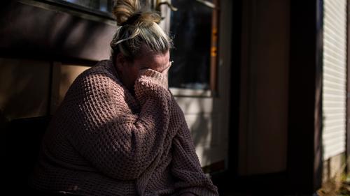 Laura Gallagher, of Langhorne, Pa., tears up in front of her home due to the fear of being evicted with nowhere to go on Wednesday, Oct. 14, 2020. Laura Gallagher, of Langhorne, Pa., tears up in front of her home due to the fear of being evicted with nowhere to go on Wednesday, Oct. 14, 2020.