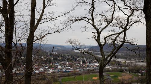 Dense tree cover and hilly ground drive up the cost of building broadband infrastructure across much of rural Pennsylvania.