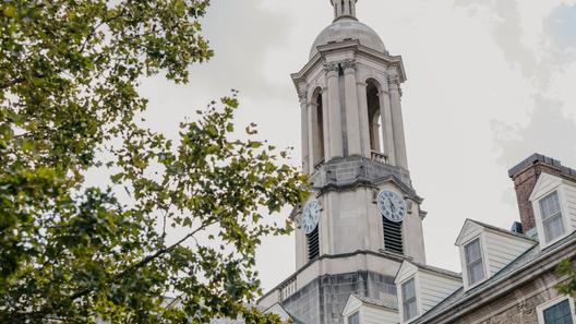The bell tower of Old Main on Penn State's campus
