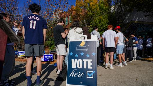 People wait in line to vote Nov. 5, 2024, at the Banana Factory in Bethlehem, Pa.