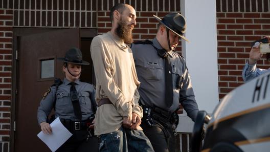Cody Balmer is escorted from court after his preliminary arraignment on Monday, April 14, 2025, in Harrisburg, Pa.