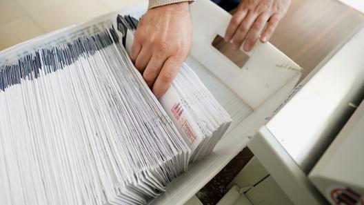 Mail ballots are sorted and counted by workers on Election Day in Northampton County.