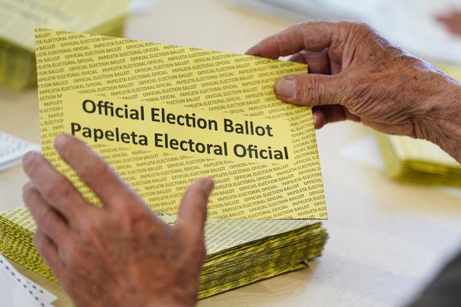 Workers sort mail ballots on primary Election Day 2024 at Northampton County Courthouse in Easton, Pennsylvania. Workers sort mail ballots on primary Election Day 2024 at Northampton County Courthouse in Easton, Pennsylvania.