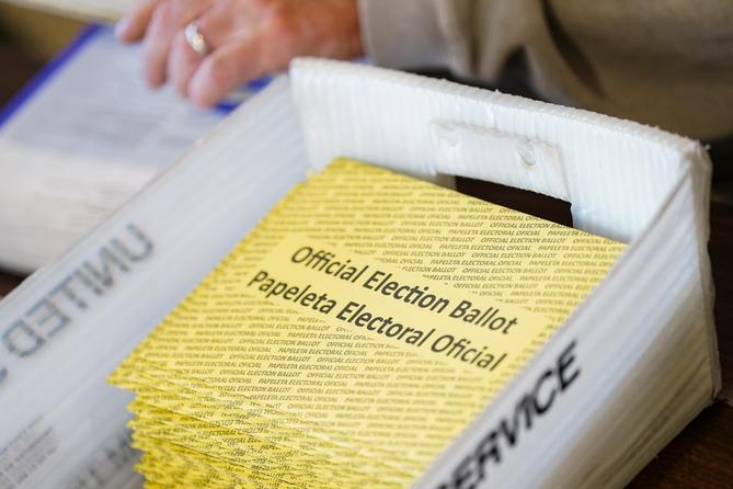 Workers sort mail ballots on Nov. 5, 2024, at Northampton County Courthouse in Easton, Pennsylvania.