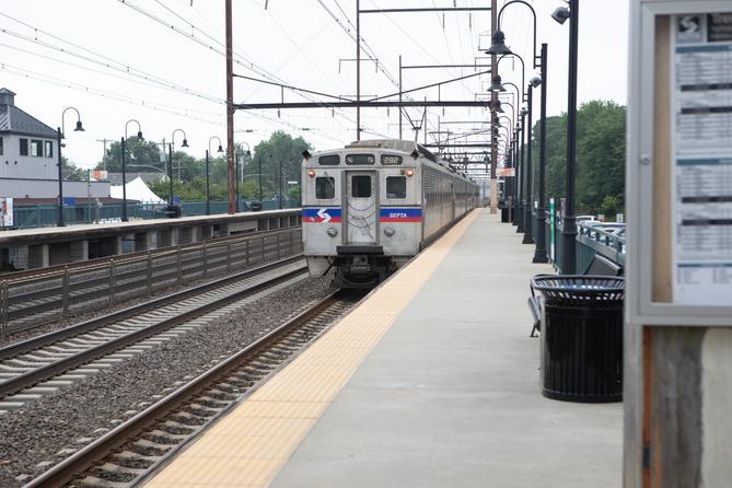 A SEPTA train approaches a station.