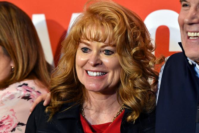 GOP Pennsylvania treasurer Stacy Garrity poses for photos at a campaign event in April, 2024, in Harrisburg, Pa.