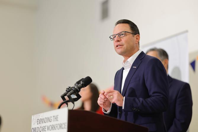 Gov. Josh Shapiro speaks at a news conference, highlighting child care recruitment and retention bonuses that were passed as part of the 2025-26 state budget.