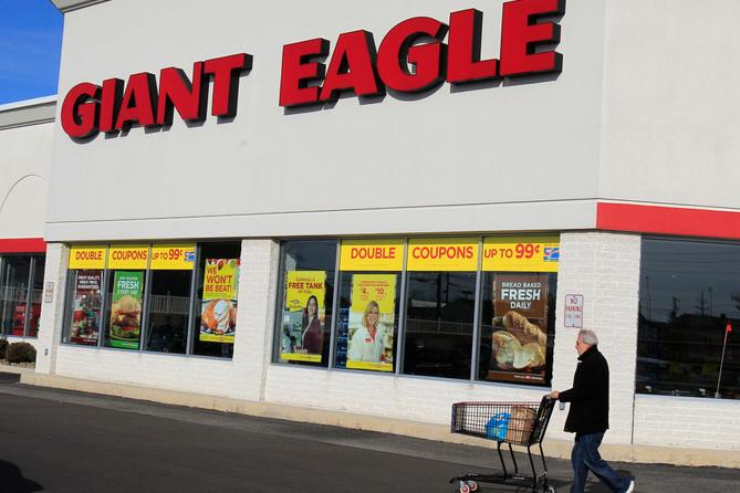 A man walks out of the Giant Eagle grocery store Thursday, Nov. 17, 2011, in Mayfield Heights, Ohio. A man walks out of the Giant Eagle grocery store Thursday, Nov. 17, 2011, in Mayfield Heights, Ohio.
