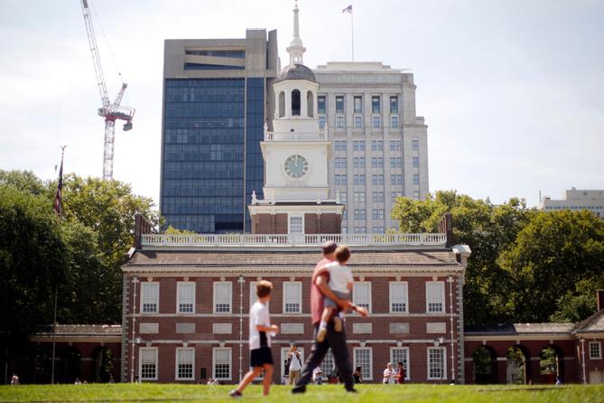 People move past Independence Hall at the Independence National Historical Park in Philadelphia, Aug. 25, 2016. People move past Independence Hall at the Independence National Historical Park in Philadelphia, Aug. 25, 2016.