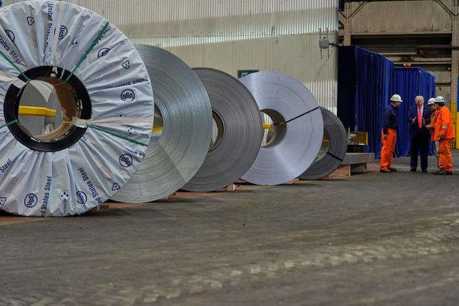 President Donald Trump talks to workers as he tours U.S. Steel Corporation's Mon Valley Works-Irvin plant, Friday, May 30, 2025, in West Mifflin, Pa.