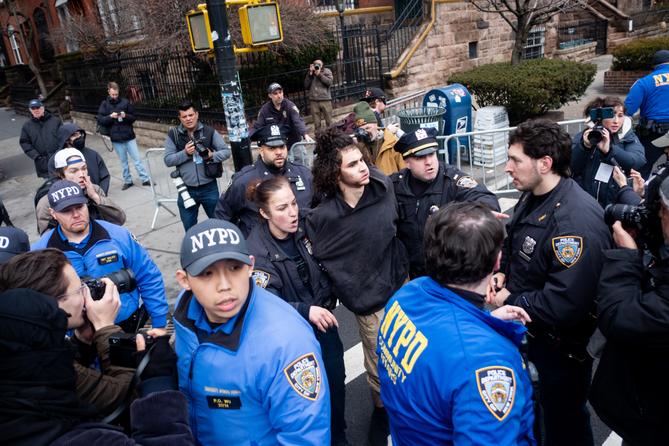 Police detain Emir Balat outside Gracie Mansion, Saturday, March 7, 2026, in New York. Police detain Emir Balat outside Gracie Mansion, Saturday, March 7, 2026, in New York.
