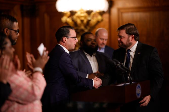 Gov. Josh Shapiro shakes hands with state Senate Majority Leader Joe Pittman (right) in 2023.
