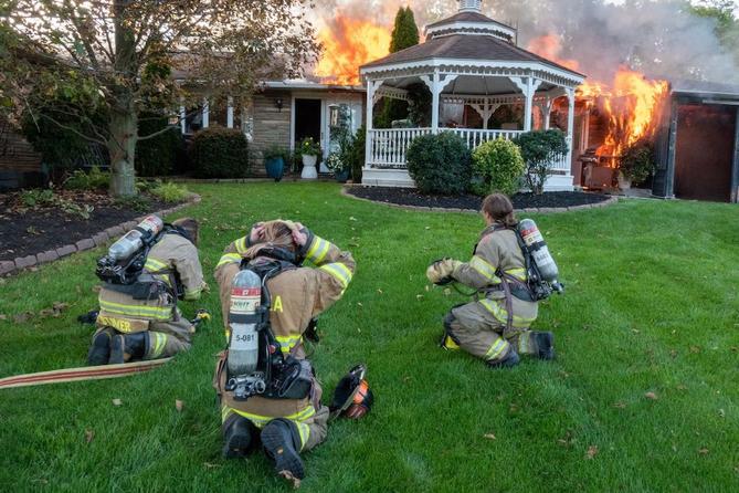 Firewomen of Alpha Fire Company in action.