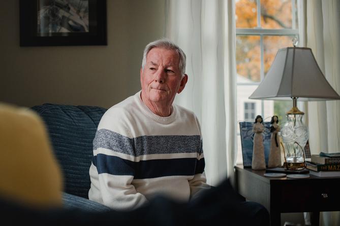 Election worker John "Jay" Schneider, 76, sits for a portrait at his Downingtown Pa. home on Monday, October 30, 2023.