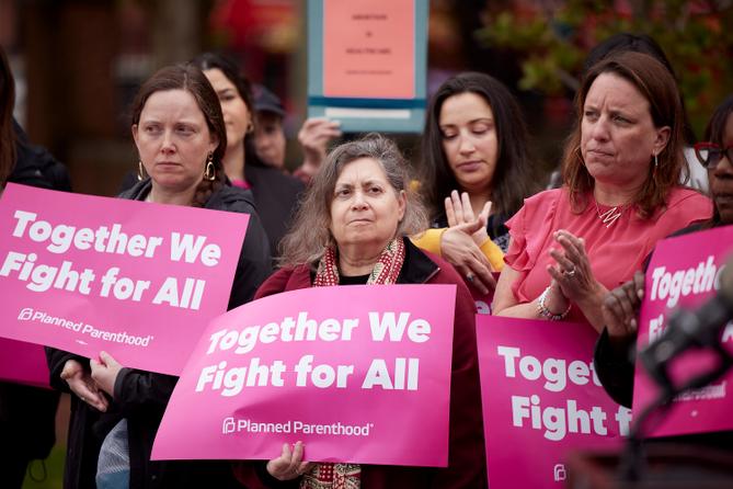 Public officials and members of Planned Parenthood at a 2022 news conference about the overturning of Roe v. Wade.