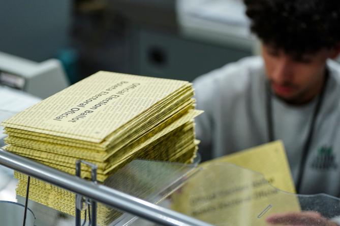 Lehigh County voter registration workers sort mail ballots Nov. 5, 2024, in Allentown, PA.