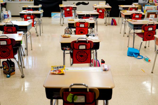 Desks are arranged in a classroom at an elementary school in Nesquehoning, Pa., March 11, 2021.