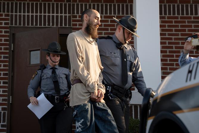 Cody Balmer is escorted from court after his preliminary arraignment on Monday, April 14, 2025, in Harrisburg, Pa.