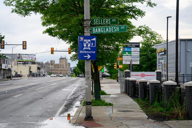 Street signs mark Sellers Avenue, which is also called Bangladesh Avenue, in Millbourne.