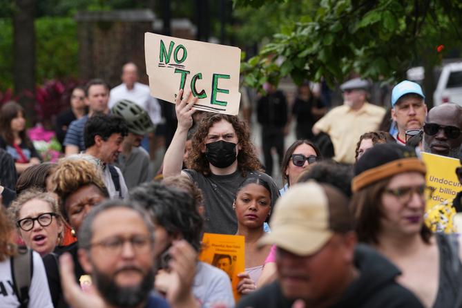 People gather to protest the deployment of the National Guard in Los Angeles and the detainment of union leader David Huerta near Independence Hall in Philadelphia, Monday, June 9, 2025.