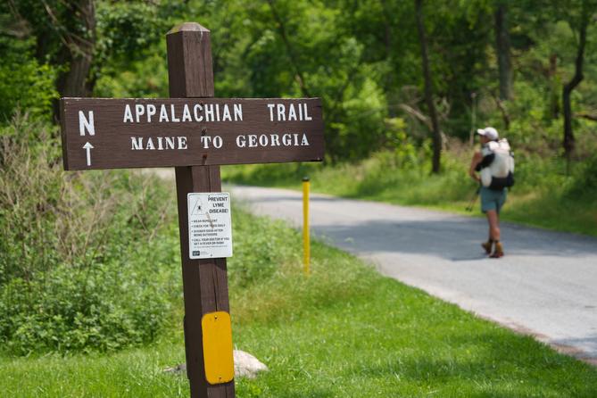 Appalachian Trail thru-hiker Noritaka Mizumoto, from Osaka, Japan, walks the Appalachian Trail at Pine Grove Furnace State Park in Pennsylvania.
