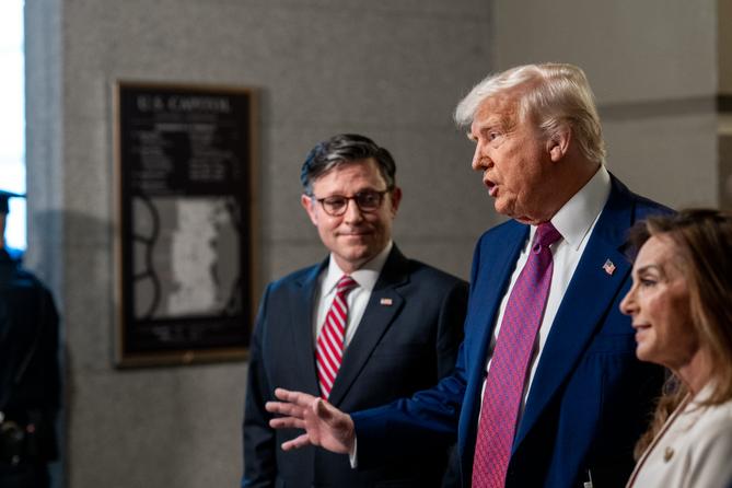 President Trump and Speaker of the House Mike Johnson (R., La.) speak to members of the media at the U.S. Capitol in Washington, D.C., Tuesday, May 20, 2025, before meeting with the House GOP Conference about passing Trump's budget bill.