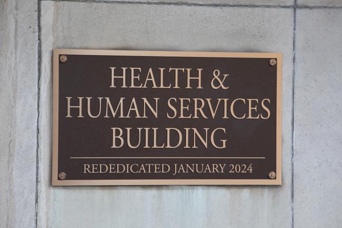 A placard outside the Pennsylvania Health & Human Services building in Harrisburg.
