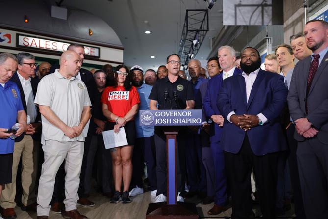 Gov. Josh Shapiro, fellow Democrats, SEPTA officials, and others call for transit funding in Philadelphia in August, 2025.