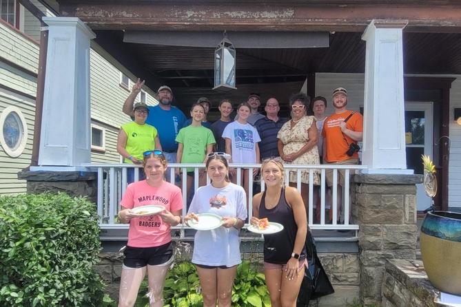 Mayor Michele Bannon (third from right in top row) poses with Group Mission Trips volunteers at a small home repairs project in Carbondale.