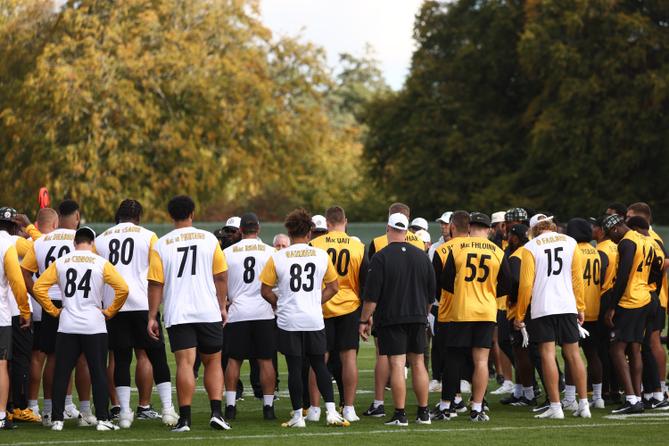 Pittsburgh Steelers players huddle during football practice ahead of their game against the Minnesota Vikings in Dublin.