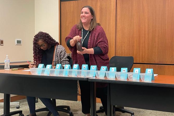 Christa Miller, Lancaster County’s election director, shakes a bottle filled with red, numbered marbles to determine the winner of tied races. Christa Miller, Lancaster County’s election director, shakes a bottle filled with red, numbered marbles to determine the winner of tied races.