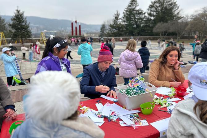 Bethlehem Mayor J. William Reynolds signs bookmarks at a tree decorating event on Nov. 21, 2025. Bethlehem Mayor J. William Reynolds signs bookmarks at a tree decorating event on Nov. 21, 2025.