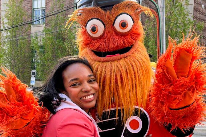 Media Mayor Joi Washington with Philadelphia Flyers mascot Gritty.