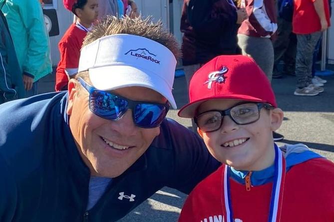 Tom Frebel with a young player in the Baseballtown Charities Dream League.