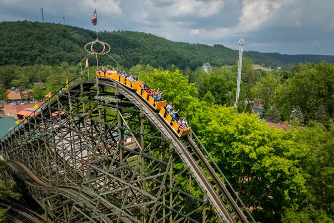 Riders on Knoebels’ Phoenix roller coaster begin their descent. Riders on Knoebels’ Phoenix roller coaster begin their descent.