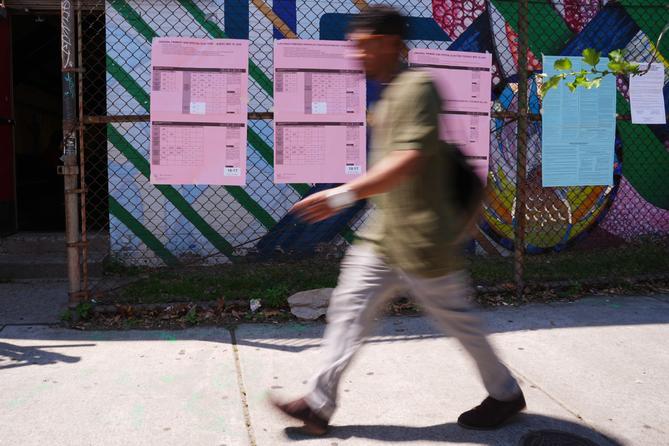 A person walks past sample ballots outside a polling place in Philadelphia, Tuesday, May 19, 2026. A person walks past sample ballots outside a polling place in Philadelphia, Tuesday, May 19, 2026.
