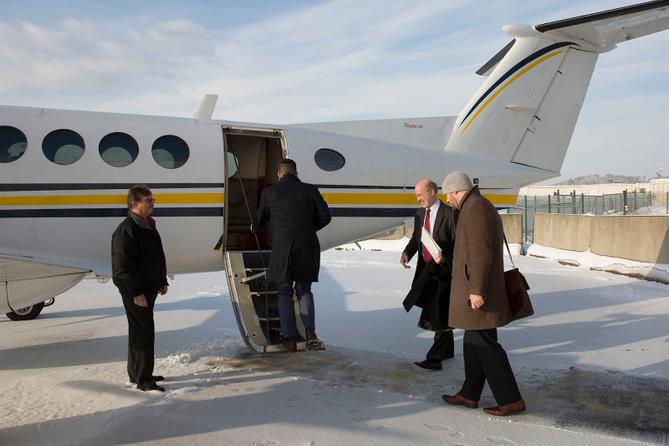 Former Gov. Tom Wolf boards the state plane in 2016.