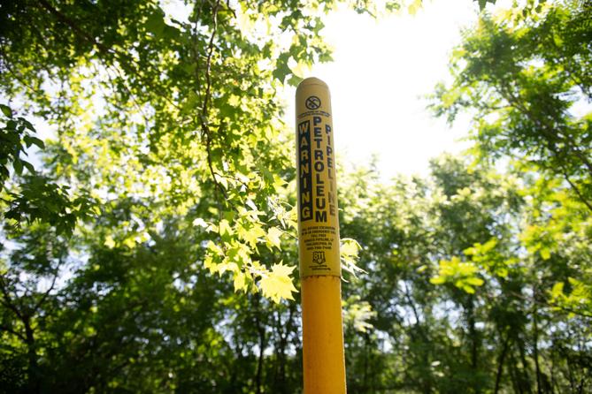 A marker for an Energy Transfer petroleum pipeline stands near the Delaware River in Upper Makefield Township, Pa. A marker for an Energy Transfer petroleum pipeline stands near the Delaware River in Upper Makefield Township, Pa.