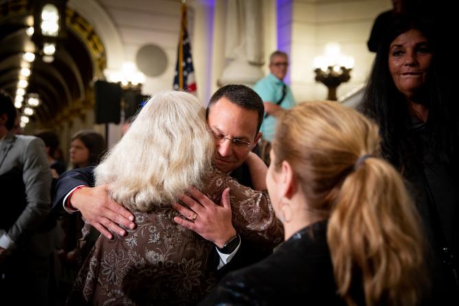 Then-Attorney General Josh Shapiro hugs a person after a 2018 rally to push for the legislature to adopt reforms allowing sexual abuse survivors to file civil lawsuits. Then-Attorney General Josh Shapiro hugs a person after a 2018 rally to push for the legislature to adopt reforms allowing sexual abuse survivors to file civil lawsuits.