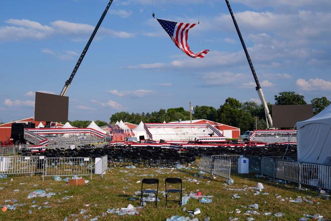 A campaign rally site for Republican presidential candidate former President Donald Trump is empty and littered with debris on July 13, 2024, in Butler, Pa. A campaign rally site for Republican presidential candidate former President Donald Trump is empty and littered with debris on July 13, 2024, in Butler, Pa.