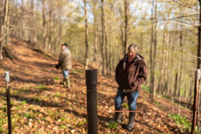 Cheryl and Joe Thomas have dozens of uncapped wells on their Pa. property. Some are open pipes, others are gaping holes.