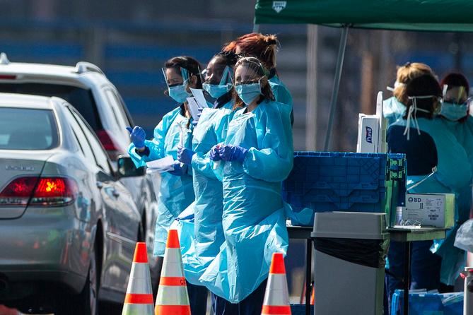 New guidance says surgical face masks should be used rather than the more protective N95 respirators in most situations.